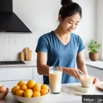 단백질 보충제 섭취 방법과 추천 브랜드 - A modern Japanese kitchen scene with a young adult Japanese person preparing a morning protein shake...